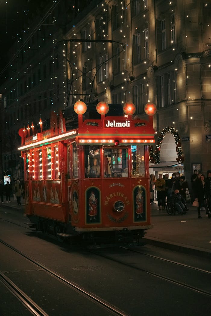 festively-decorated-tram-on-a-winter-night-28697839